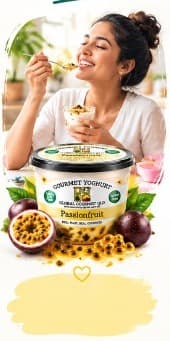 Woman enjoying Passionfruit yoghurt after dinner